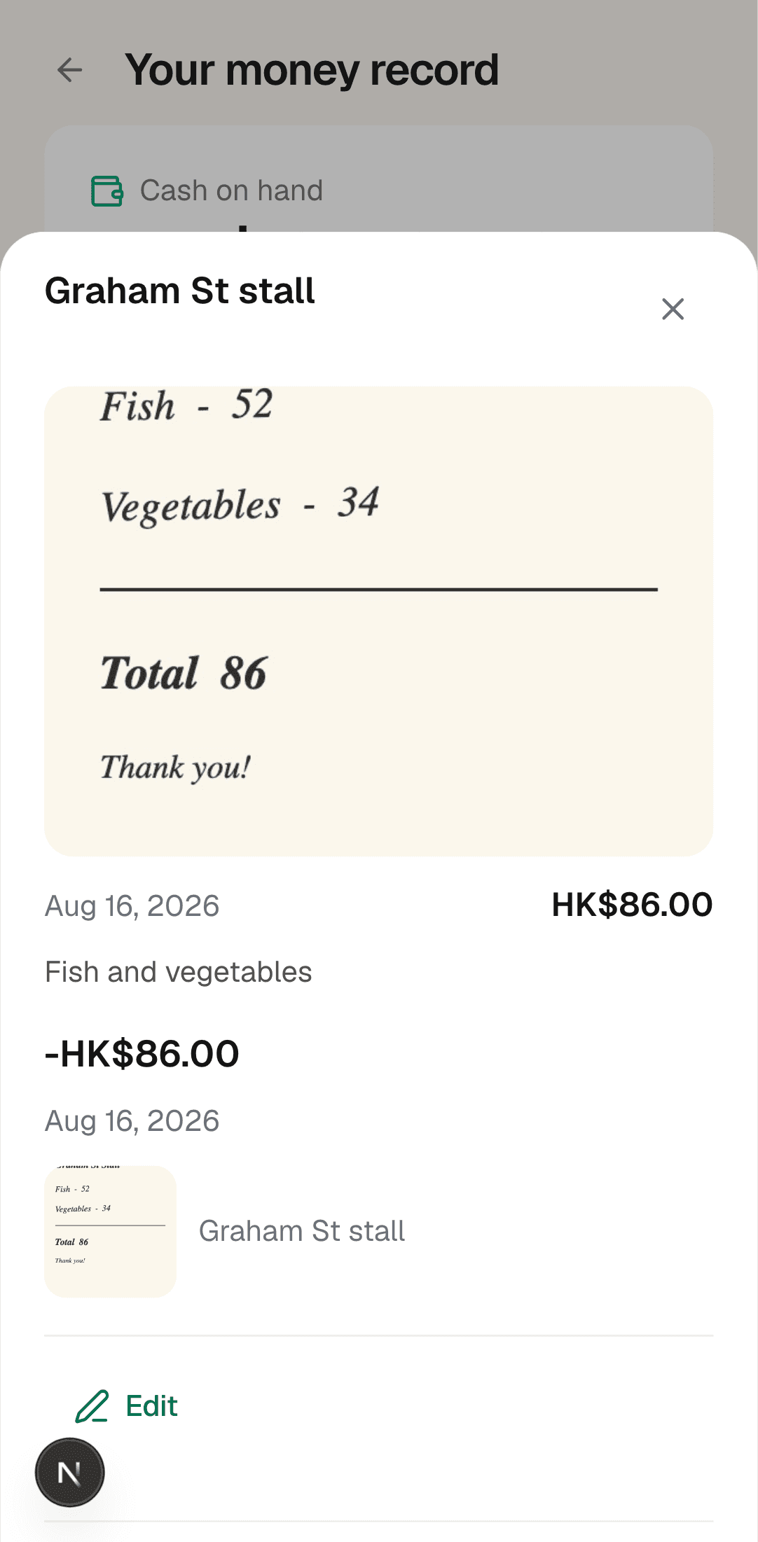 A handwritten stall note photographed into SamaKasa — fish 52, vegetables 34, total 86 — kept as a HK$86.00 spend from Graham St stall with the helper's note beside it.